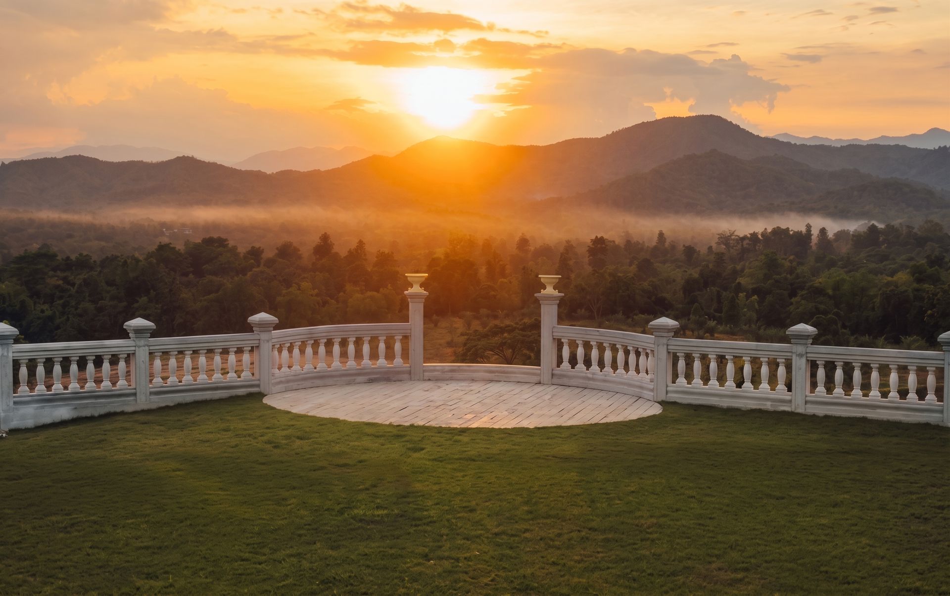 Bloomemories terrace at golden hour overlooking the misty Chiang Mai mountains